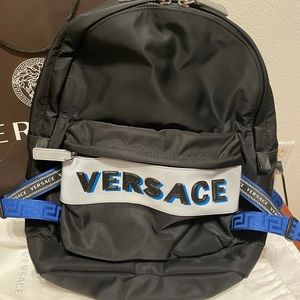 Versace backpack with leather accents like new retail price 1225$